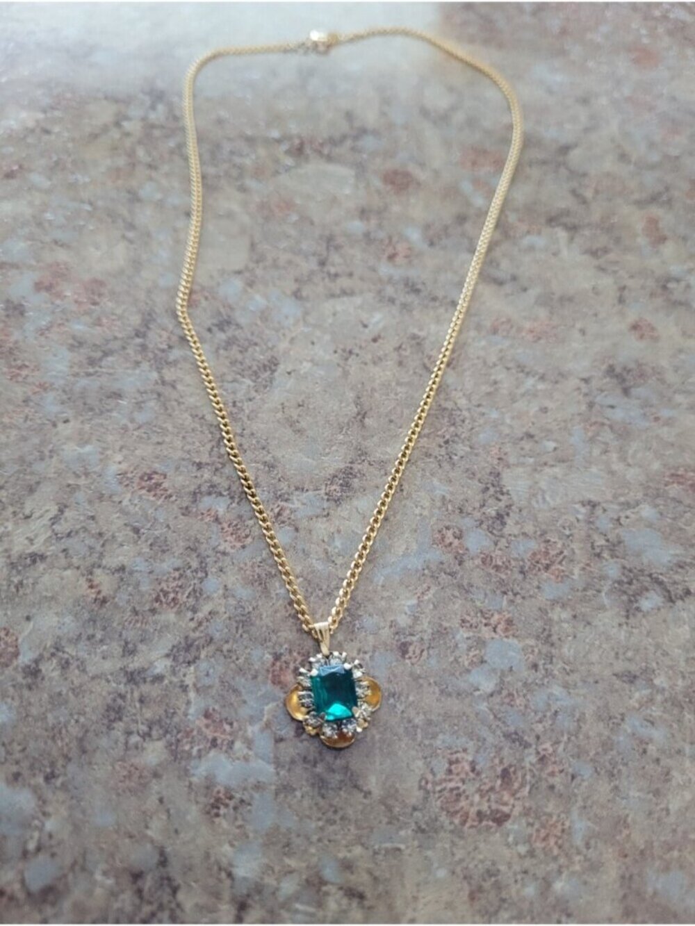 Gold Plated Chain Necklace with Emerald Gemstone Flower Charm Pendant.